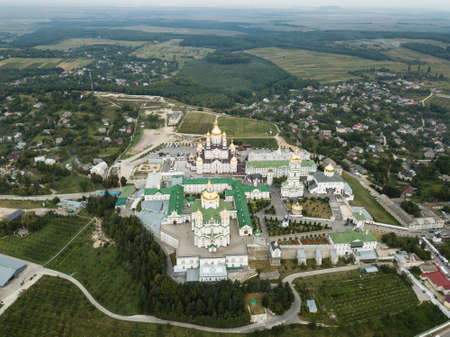 Aerial view to largest Orthodox church complex and monastery - The Dormition Pochayiv Lavra was...