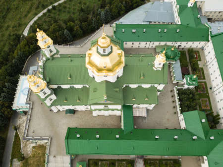 Aerial view to largest Orthodox church complex and monastery - The Dormition Pochayiv Lavra was...