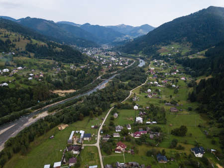 Famous green tourism village Kryvorivnia in Carpathians mountains at summer, typical landscape in Hutsulshchyna National Park in Ukraine. Vacation and outdoor sports.の写真素材