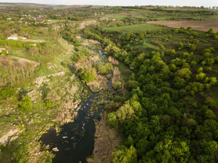 Aerial amazing view to Buky Canyon on sunny day. Buki Canyon on the Hirskyi Tikich river, Cherkassy region, Ukraineの写真素材