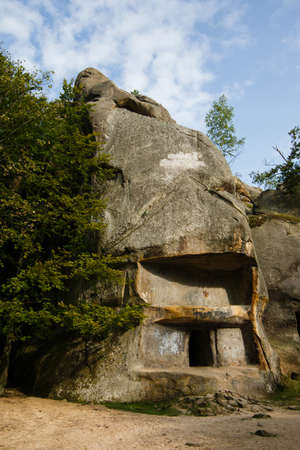 Dovbush Rocks in Bubnyshche. Legendary ancient cave monastery in fantastic boulders amidst beautiful scenic forests in Carpathian Mountains, Ukraineの写真素材