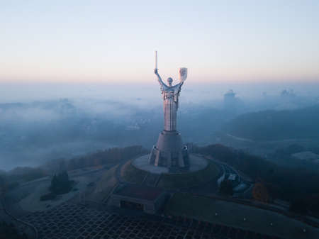 Kyiv, Ukraine - November 10 2018: Aerial view of Mother Motherland statue in Kyiv on early morming with fog from river Dnieper, Ukraineのeditorial素材