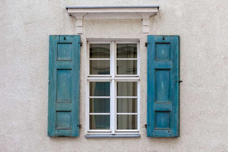 Windows with closed shutters.の写真素材