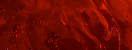 Long banner. Close up gel texture of cosmetic products. red abstract background with bubbles. macro photo. blur and selective focus.の写真素材