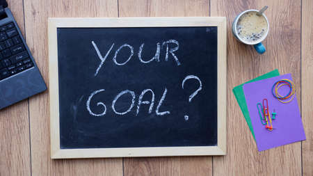 Your goal written on a chalboard at the officeの写真素材