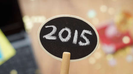 New year 2015 written on a chalkboard at the officeの写真素材