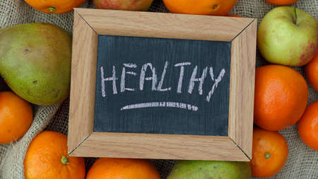 Healthy written between fruitの写真素材