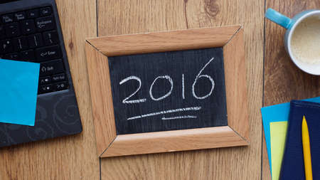 2016 written on a chalkboard at the officeの写真素材