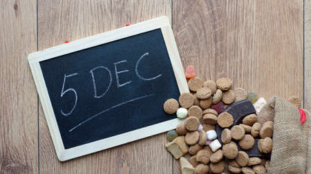 5th of December in Dutch written on a chalkboard for the Dutch Santa-Clausの写真素材