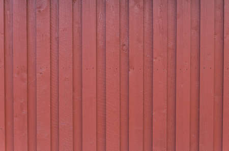 Wood painted in typical scandinavian red colorの写真素材