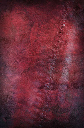 Deep Red Grungy Background with scratches and damagesの写真素材