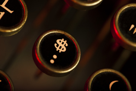 Close up of the dollar sign key on a keyboard.の写真素材