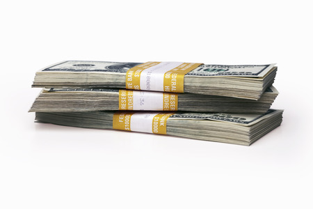 stack of wrapped one hundred dollar bills