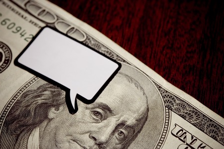 One hundred dollar bill making a statement. 