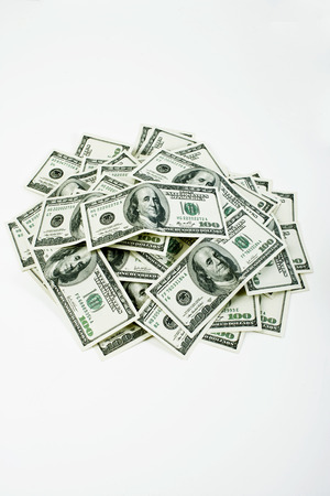 Pile of hundred dollar bills.の写真素材