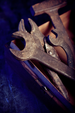 rusty tools in a wooden box.の写真素材