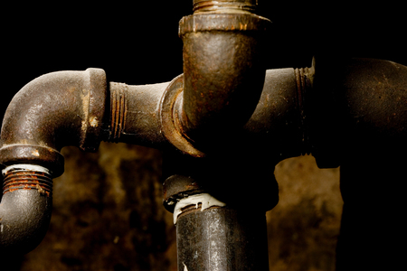 rusty pipes in the basementの写真素材
