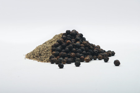 Ground and whole black pepper mount.