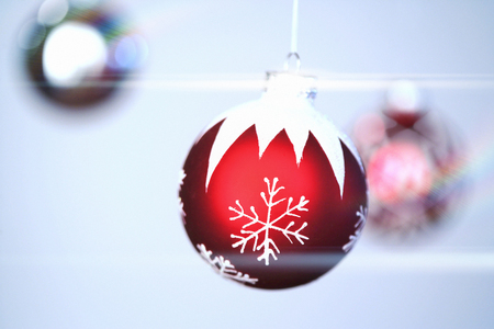 Holiday ornaments with light glareの写真素材