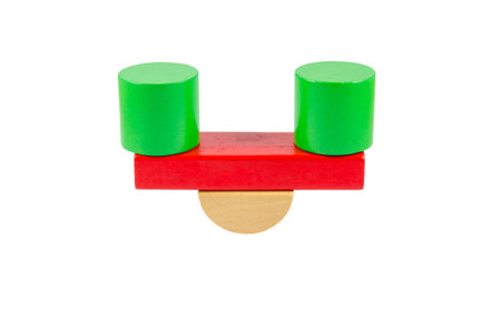 Scales from wooden toy details. It is isolated on a white backgroundの写真素材