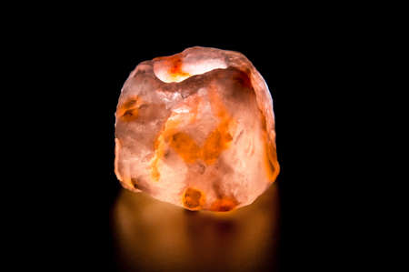 Lava fire stone on black backgroundの写真素材