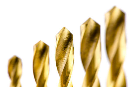 Drill bit metal bronze color on white background