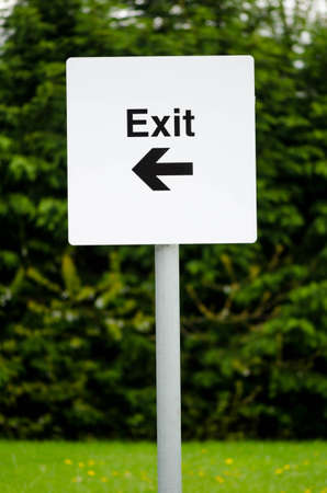 Car park exit directional sign on white boardの写真素材