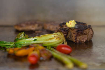 delicious steak with asparagus, tomatos and salad
