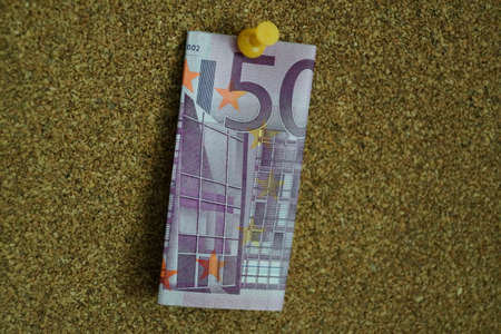 A bill on a bulletin board