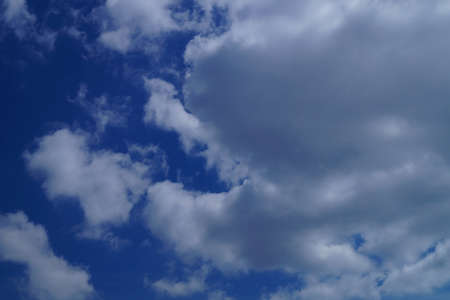 Blue sky with cloudsの写真素材