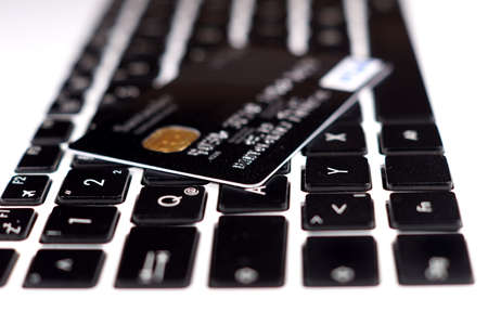 Credit card and a notebookの写真素材