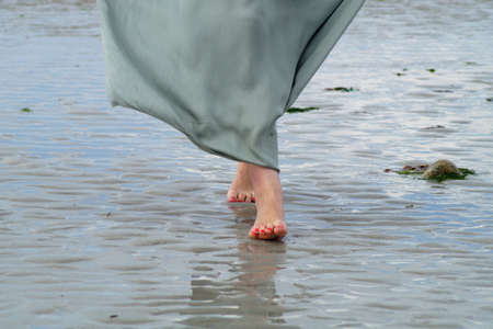 Woman on the beachの写真素材