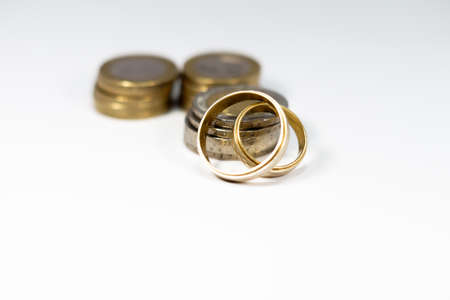 Wedding rings and moneyの写真素材