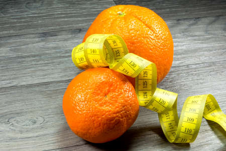 measuring tape and fruitsの写真素材
