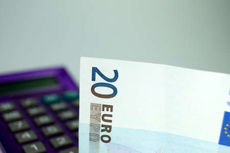 Money and a calculatorの写真素材