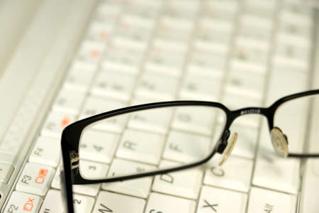 Computer and glassesの写真素材