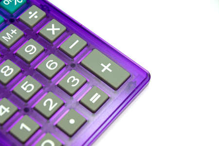 A calculator on a white backgroundの写真素材