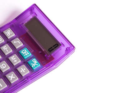 A calculator on the tableの写真素材