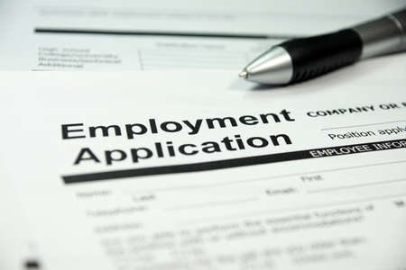 Employment application and a penの写真素材
