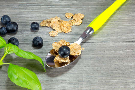 teaspoon of muesli and fruit