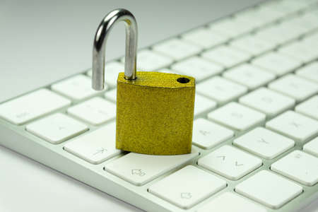 Padlock and a computerの写真素材