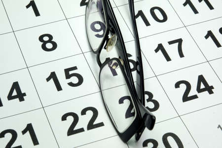 Calendar and glassesの写真素材