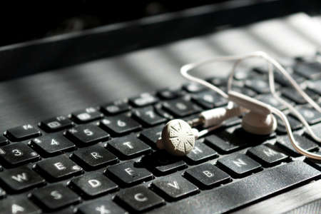 A computer and the headphonesの写真素材