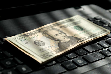 Dollar money and keyboardの写真素材
