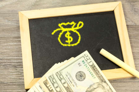 A chalk board with a purseの写真素材