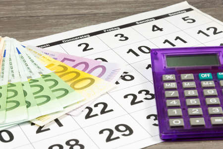 Euro money, calculator and calendarの写真素材
