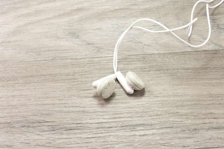 White headphones on the table