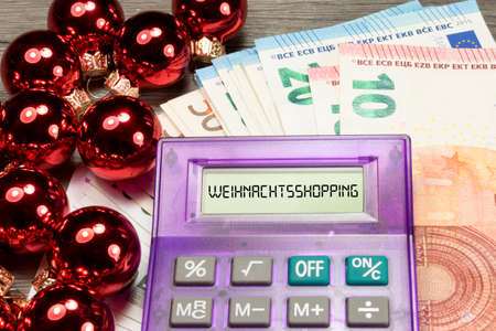 Euro money and Christmas shoppingの写真素材