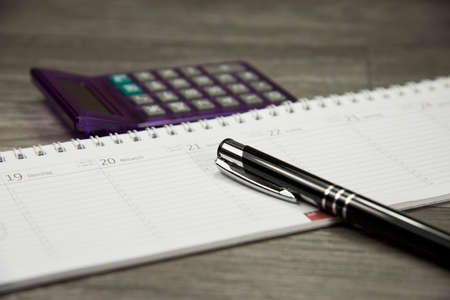Calendar, calculator and pen