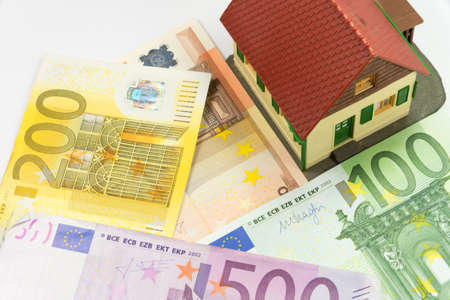 A house and many euro billsの写真素材